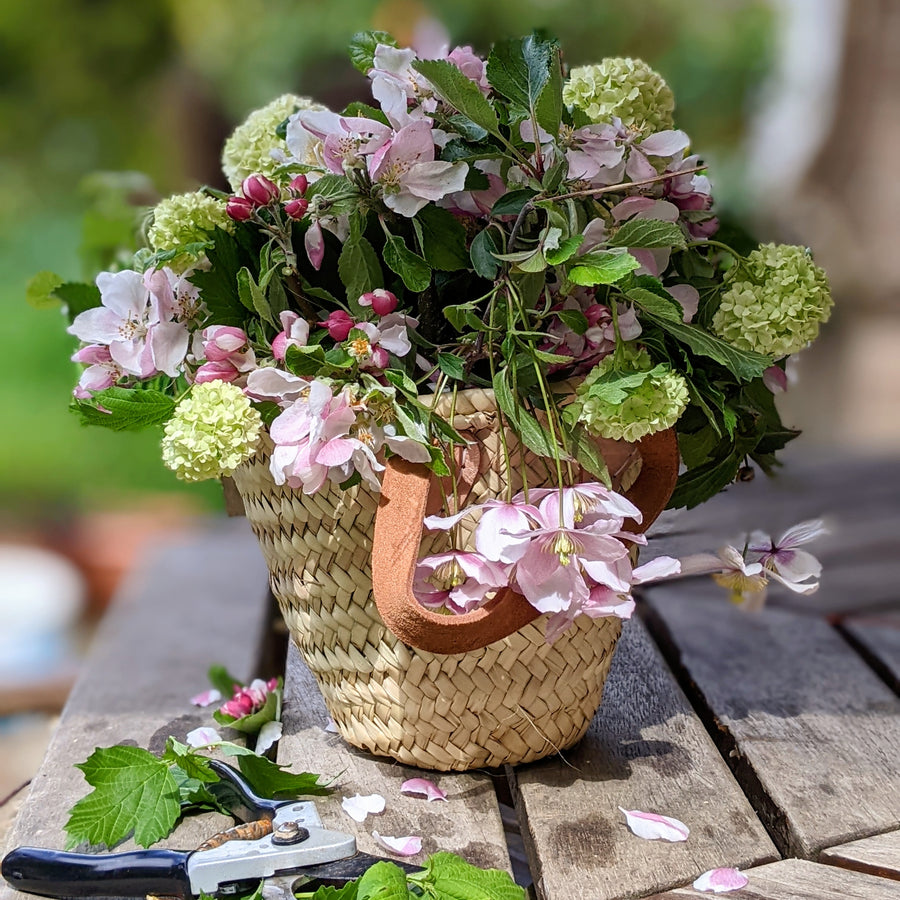 French mini basket used as flower display