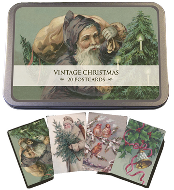 Vintage Christmas postcards in a tin with illustrations of a man with a sack, birds, and trees.